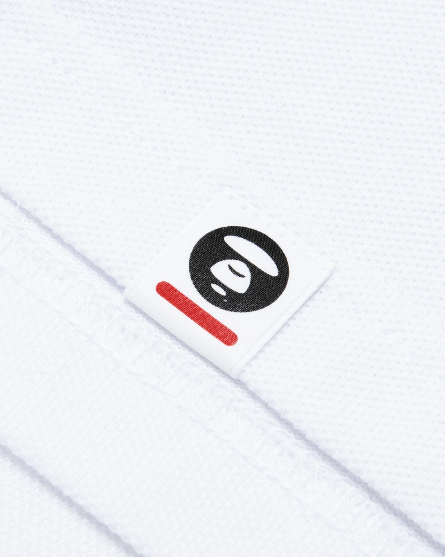 Moonface embroidered twin tipped polo - Image 23