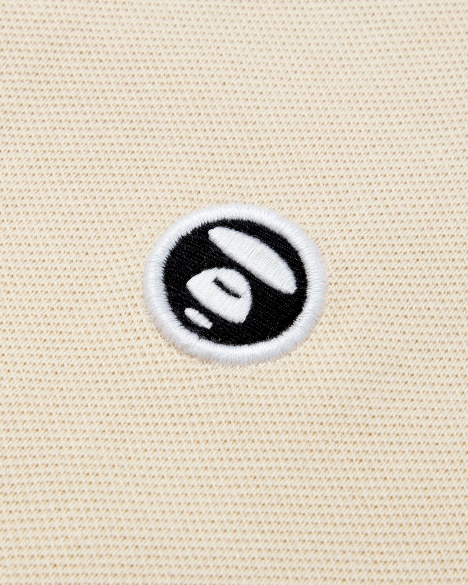 Moonface embroidered twin tipped polo - Image 3